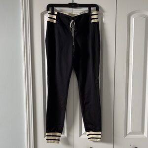 Athleta Black Track Pants with Cream Stripe Details